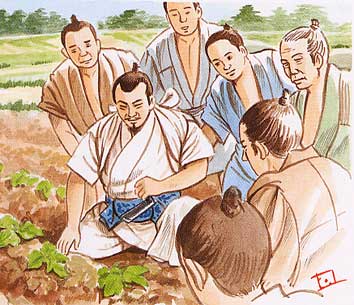 説明する野國總管